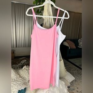 Bundle 2 Bodycon Mini Dresses size large in pink and white